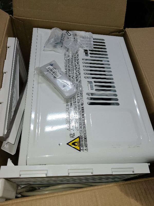 Photo 1 of LG 6,000 BTU Window Air Conditioner, Cools 250 Sq.Ft. (10' x 25' Room Size), Quiet Operation, Electronic Control with Remote, 2 Cooling & Fan Speeds, 2-Way Air Deflection, Auto Restart, 115V