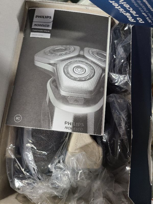 Photo 1 of Philips Norelco Shaver Series 9000, Wet and Dry Electric Shaver, with Lift & Cut Shaving System and SenseIQ Technology, Pop-up Trimmer, Cleaning Pod, Charging Stand and Travel Case, Model S9987/85