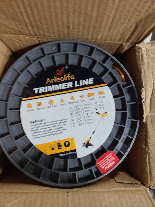 Photo 1 of A ANLEOLIFE 5-Pound Commercial Square .095-Inch-by-1280-ft String Trimmer Line in Spool,with Bonus Line Cutter, Orange