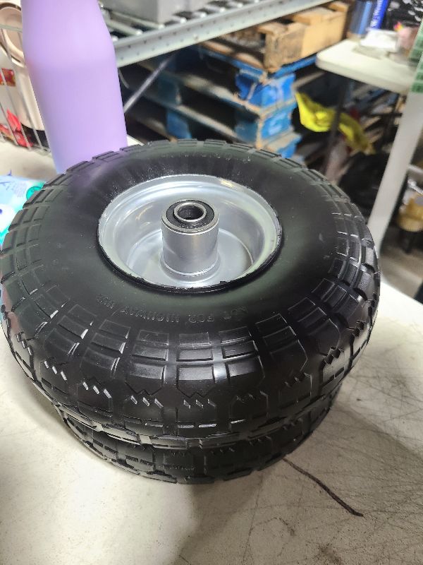 Photo 1 of 4.10/3.50-4 Flat Free Tire, 10 Inch Solid Rubber with 5/8'Axle Bore Hole and Double Sealed Bearings, 4 Pack for Dolly/Hand Truck/Dump Cart Wheels