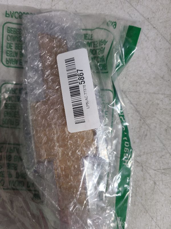 Photo 1 of Genuine GM 95122465 Grille Emblem, Front