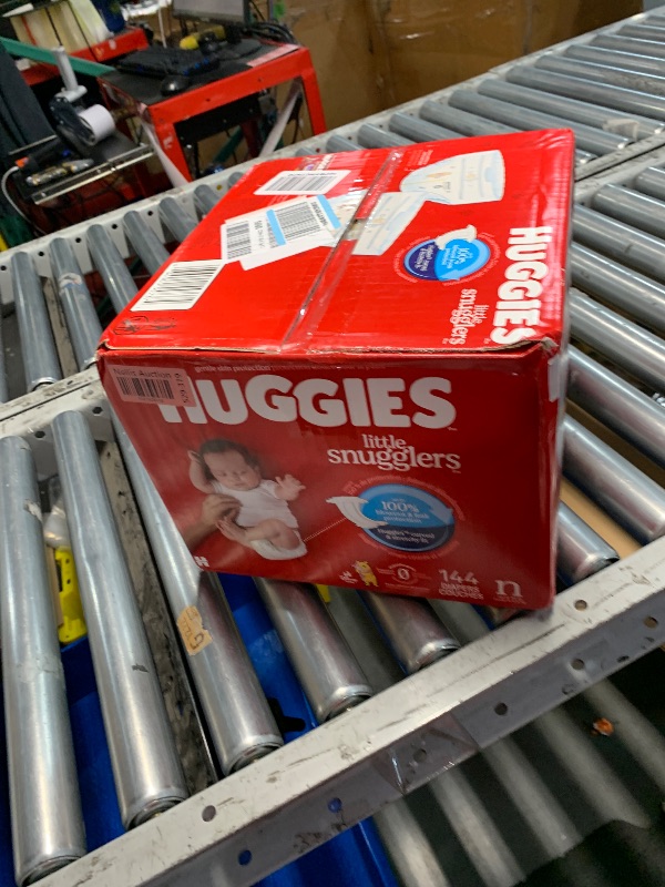 Photo 1 of *** FACTORY SEALED*** Huggies Newborn Diapers, Little Snugglers Baby Diapers, Size Newborn (up to 10 lbs), 144 Count