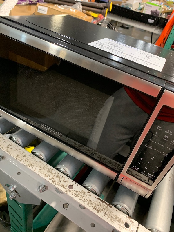 Photo 1 of (used)(see images) BLACK+DECKER 0.7-cu ft Small (Less than 1.5-cu ft) 700 -Watt Countertop Microwave ( Stainless Steel )