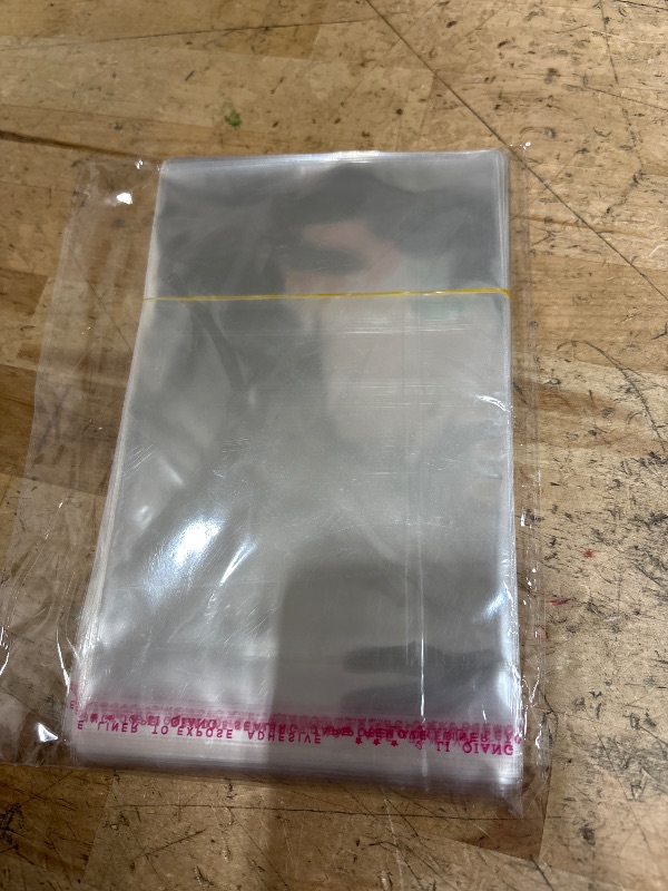Photo 1 of 100 Pcs Cellophane Bags, 4.7x6.7 Inch Cookie Bags With Seal, Clear Self Sealing Cellophane Bags for Snacks Candy Bread Desserts Party Favors