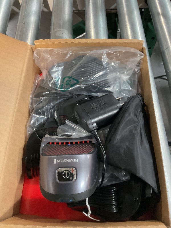 Photo 1 of Remington Shortcut Pro Self-Haircut Trimmer Kit, Waterproof Cordless Electric Razor for Head, Beard, and Body, Curved Blades and 9 Trimmer Lengths, Head Shaver, 5-Minute Quick-Charge, 14-Piece Set