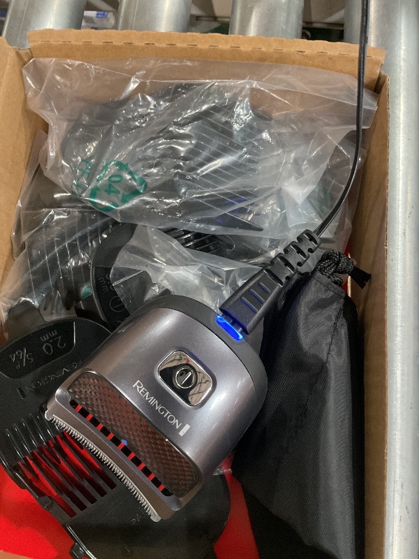 Photo 1 of Remington Shortcut Pro Self-Haircut Trimmer Kit, Waterproof Cordless Electric Razor for Head, Beard, and Body, Curved Blades and 9 Trimmer Lengths, Head Shaver, 5-Minute Quick-Charge, 14-Piece Set