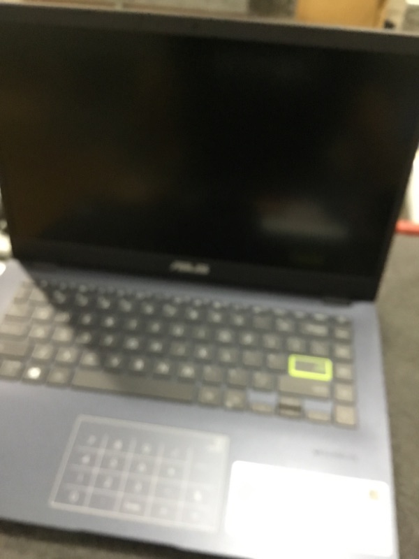 Photo 1 of ******PARTS ONLY******* DOES NOT TURN ON ******ASUS L410 MA-DB02 Ultra Thin Laptop, 14” FHD Display, Intel Celeron N4020 Processor, 4GB RAM, 64GB Storage, NumberPad, Windows 10 Home in S Mode, Star Black