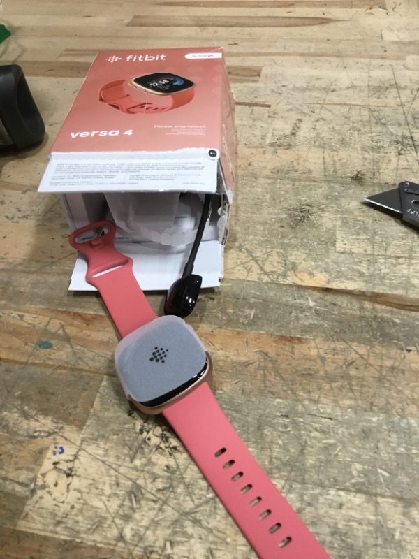 Photo 1 of ***BATTERY PROBLEMS***Fitbit Versa 4 Fitness Smartwatch with Daily Readiness, GPS, 24/7 Heart Rate, 40+ Exercise Modes, Sleep Tracking and more, Pink Sand/Copper Rose, One Size (S & L Bands Included)