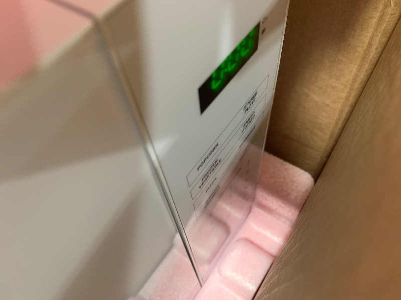 Photo 1 of 1.1 Cu. Ft. Countertop Microwave Oven in White
