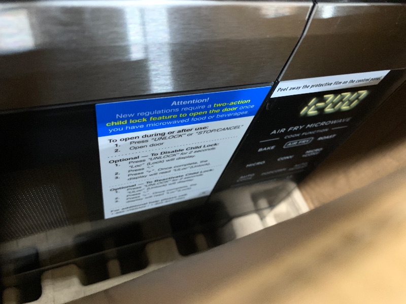 Photo 1 of 0.9 Cu. Ft. 900-Watt Countertop Convection Microwave in Stainless Steel with Air Fryer
