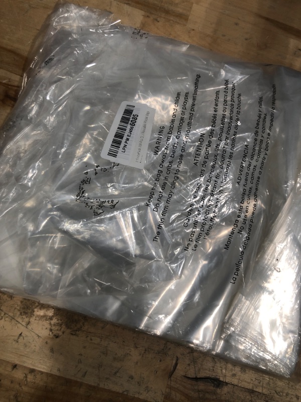 Photo 1 of 100 Clear Plastic Bags with Handles - 12"x15" Glossy Retail Shopping Bags for Small Business, Boutique, Gift and Trade Show