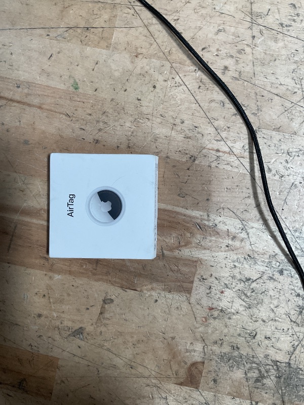 Photo 1 of Apple AirTag. Keep Track of and find Your Keys, Wallet, Luggage, Backpack, and More. Simple one-tap Set up with iPhone or iPad