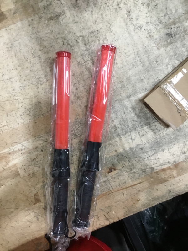 Photo 1 of  2 pack orange traffic wands. 