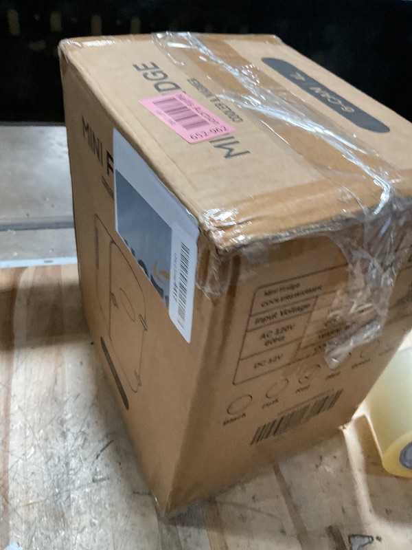 Photo 1 of ***(MINOR DAMAGE/ SEE NOTES)***HONEYWELL Portable Mini Fridge, 4 Liter 6 Can Cooler and Warmer Compact Refrigerators with Observation Window, 100% Freon-Free & Eco Friendly for Drinks, 4L, BLACK