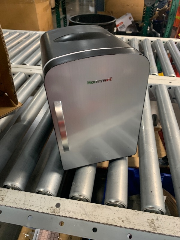 Photo 1 of ***(MINOR DAMAGE/ SEE NOTES)***HONEYWELL Portable Mini Fridge, 4 Liter 6 Can Cooler and Warmer Compact Refrigerators with Observation Window, 100% Freon-Free & Eco Friendly for Drinks, 4L, BLACK