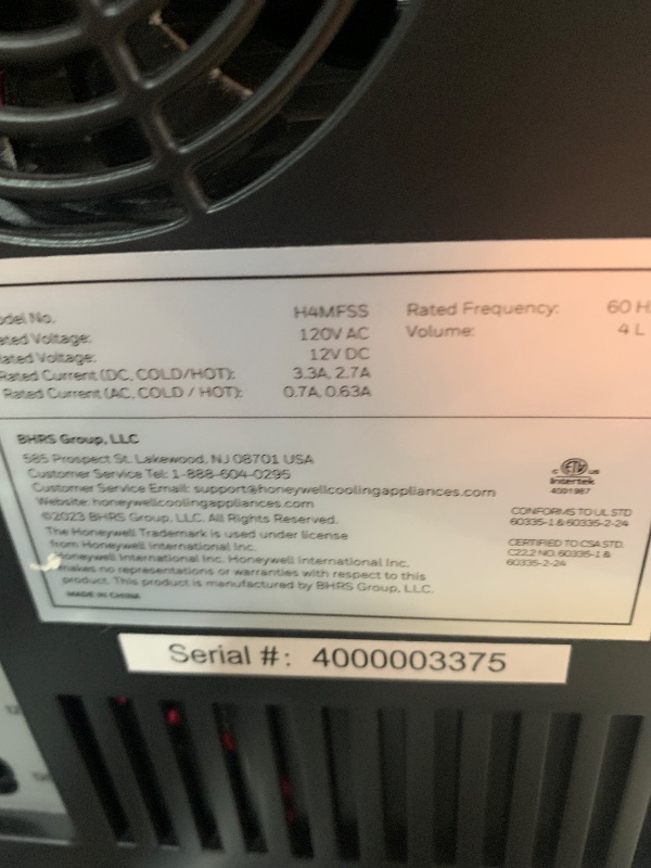 Photo 1 of ***(MINOR DAMAGE/ SEE NOTES)***HONEYWELL Portable Mini Fridge, 4 Liter 6 Can Cooler and Warmer Compact Refrigerators with Observation Window, 100% Freon-Free & Eco Friendly for Drinks, 4L, BLACK