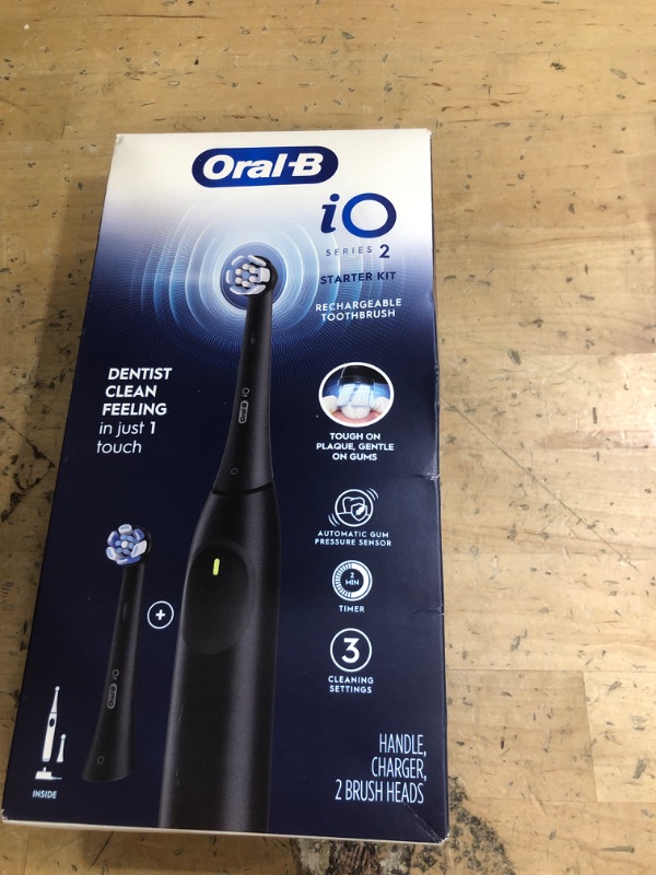 Photo 1 of (OPENED, NEW) Oral-B iO Series 2 Rechargeable Electric Powered Toothbrush Starter Kit, Night Black with 2 Brush Heads - Automatic Pressure Sensor to Protect Gums - 3 Modes - 2 Min Timer