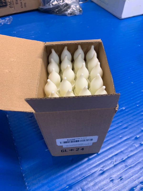 Photo 1 of Lezonic Flameless Battery Operated Candlesticks Flickering, 24Pcs White LED Battery Christmas Window Candles, 6 Inch Short Taper Candles Hanging Floating by Touch, No Remote