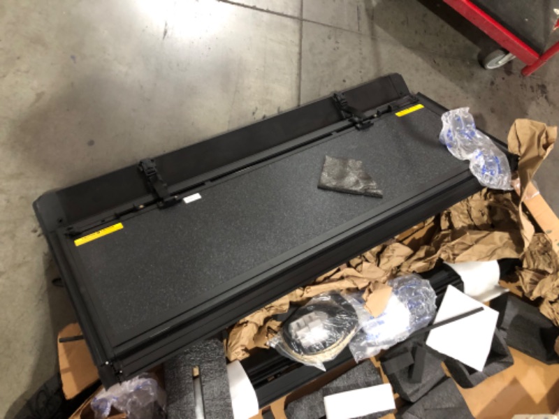 Photo 1 of ***DAMAGED - HEAVILY USED - GASKET WEATHERSTRIPPING WORN AND TORN - SEE PICTURES***
Rough Country Hard Tri-Fold Truck Bed Tonneau Cover for Toyota Tacoma (2024-2025) - Aluminum Flip-Up Folding Bed Cover, Fits 5' (60.3") Bed