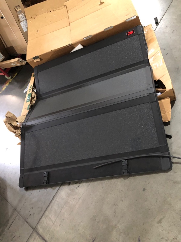 Photo 1 of ***DAMAGED - HEAVILY USED - GASKET WEATHERSTRIPPING WORN AND TORN - SEE PICTURES***
Rough Country Hard Tri-Fold Truck Bed Tonneau Cover for Toyota Tacoma (2024-2025) - Aluminum Flip-Up Folding Bed Cover, Fits 5' (60.3") Bed