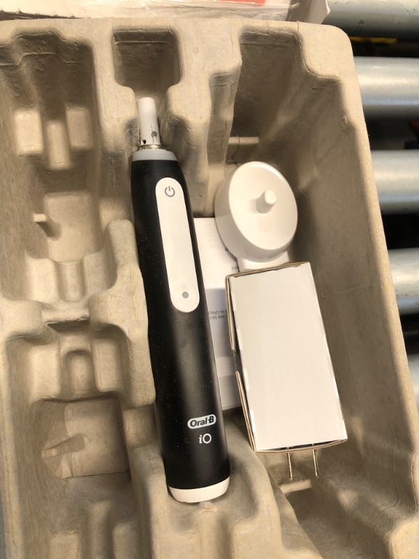 Photo 1 of (USED/FAIR) (POWER TESTED)  Oral-B iO Deep Clean Rechargeable Electric Powered Toothbrush, Black with iO Series 3 Limited, 2 Brush Heads and Travel Case - Pressure Sensor to Protect Gums - 3 Cleaning Settings - 2 Minute Timer