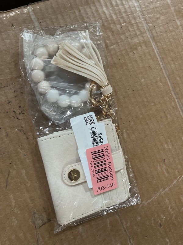 Photo 1 of ***SEE NOTES***
Sunpour Small Wristlet Wallets for Women Keychain Wristlet Wallet RFID Blocking Key Chain Wallet With Zipper Coin Pocket,2 Id Window, cream color