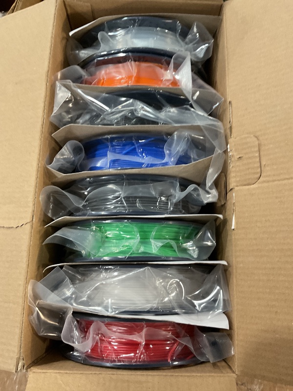 Photo 1 of SUNLU 250g PLA Filament 1.75mm Bundle,3D Printer Filament Bundle Multicolor, Neatly Wound PLA Filament, Individually Vacuum Packed,250g Spool,8 Rolls,Black+White+Grey+Transparent+Red+Blue+Orange+Green
