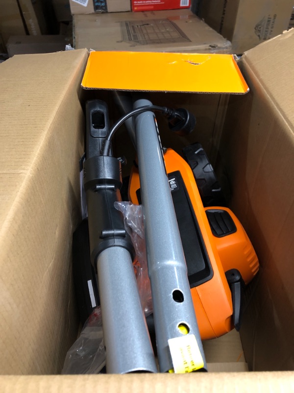 Photo 1 of WORX WG896 12 Amp 7.5 Inch Corded Electric Lawn Edger & Trencher, Orange and Black