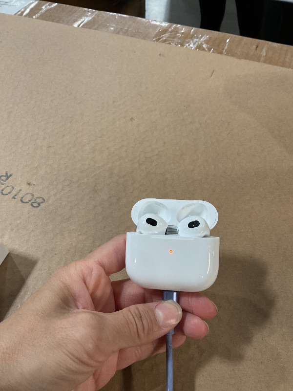 Photo 1 of ***CASE FUNCTIONS/UNKNOWN IF AIRPODS DO***

Apple AirPods (3rd Generation) Wireless Ear Buds, Bluetooth Headphones, Personalized Spatial Audio, Sweat and Water Resistant, Lightning Charging Case Included, Up to 30 Hours of Battery Life