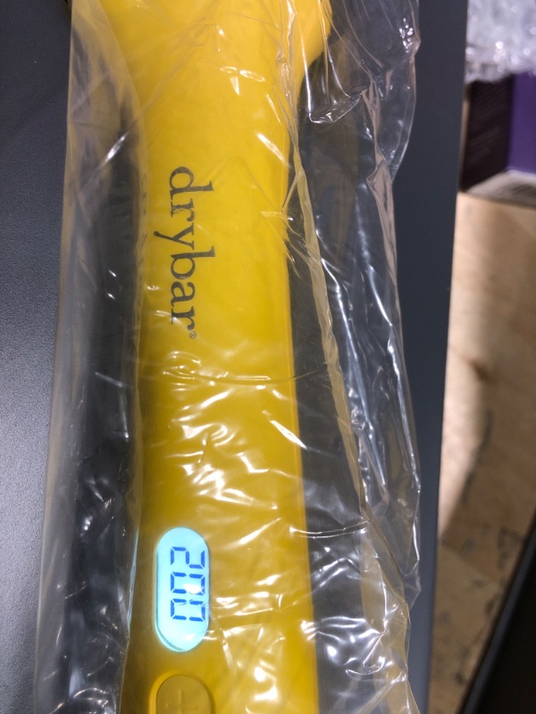 Photo 1 of Drybar The Curl Party Heated Curling Round Brush – Salon Curling Wand with Long-Lasting, Shiny Results