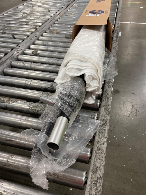 Photo 1 of **UMBRELLA USED AND DIRTY, NEEDS CLEANING**California Umbrella 9' Round Aluminum Pole Fiberglass Rib Market Umbrella, Crank Lift, Collar Tilt, White Pole, Antique Beige Olefin