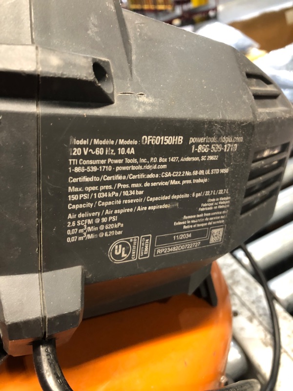 Photo 1 of *** PARTS ONLY *** RIDGID 6 Gal. 150 PSI Portable Electric Oil-Free Jobsite Pancake Air Compressor with 25 ft. Air Hose and 18GA Brad Nailer 02106416A