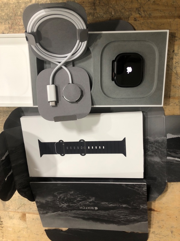 Photo 1 of Apple Watch Ultra 2 [GPS + Cellular 49mm] Smartwatch, Sport Watch with Black Titanium Case with Black Ocean Band. Fitness Tracker, Precision GPS, Action Button, Extra-Long Battery Life