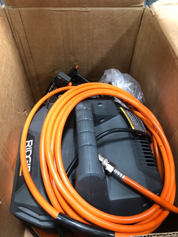 Photo 1 of RIDGID 6 Gal. 150 PSI Electric Air Compressor with 25 ft. Hose, 18GA Brad Nailer, 16GA Finish Nailer and 18GA Finish Stapler 02106416B