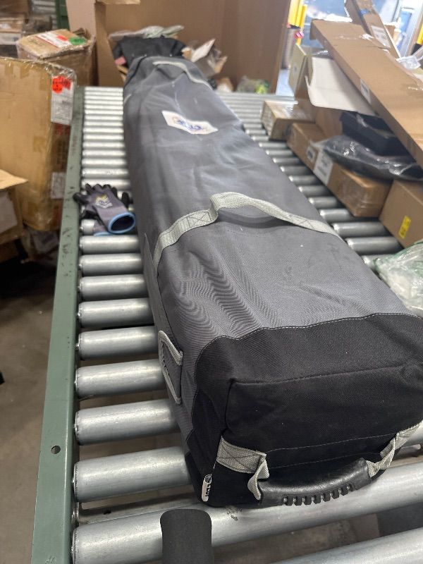 Photo 1 of *** PARTS ONLY *** E-Z UP Pyramid Instant Shelter Canopy, 10' x 10' with Wide-Trax Roller Bag & 4 Piece Spike Set, Punch