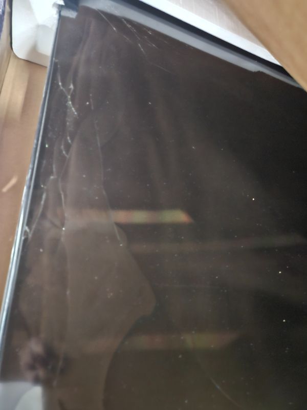 Photo 1 of ** Broken screen, final sale **  Roku Smart TV – 65-Inch Select Series 4K HDR RokuTV with Roku Enhanced Voice Remote, Brilliant 4K Picture, Automatic Brightness, & Seamless Streaming – Live Local News, Sports, Family Entertainment
