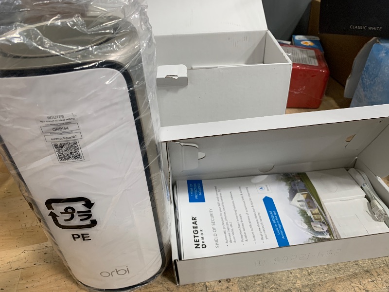 Photo 1 of ***(HEAVILY USED/ MINOR DAMAGE/ SEE NOTES BEFORE BIDDING)***NETGEAR Orbi 970 Series Quad-Band WiFi 7 Router (RBE971S), Security Features, Covers Up to 3,300 sq. ft., 200 Devices, 10 Gig Internet Port, Expandable to Create A Mesh System, BE27000 (Up to 27G