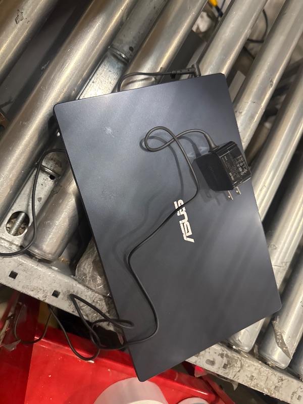 Photo 1 of *POWERS ON//ONLY COMPUTOR AND CHARGER INCLUDED* ASUS L410 MA-DB02 Ultra Thin Laptop, 14” FHD Display, Intel Celeron N4020 Processor, 4GB RAM, 64GB Storage, NumberPad, Windows 10 Home in S Mode, Star Black
