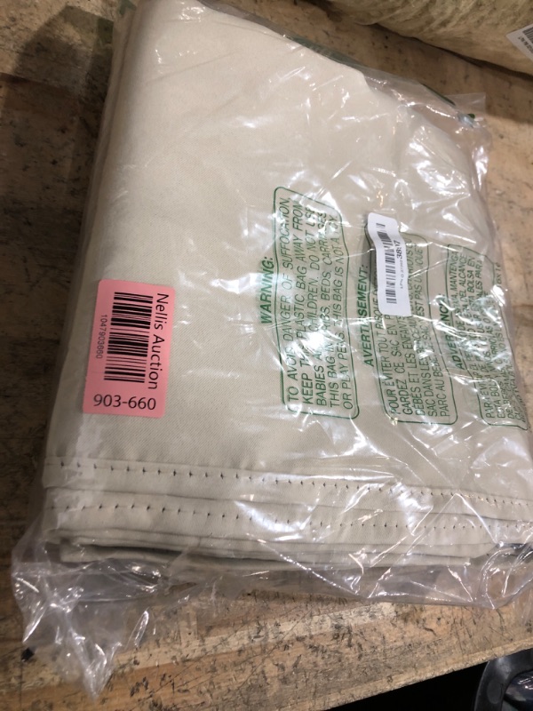 Photo 1 of cream colored curtains, unknown dimensions