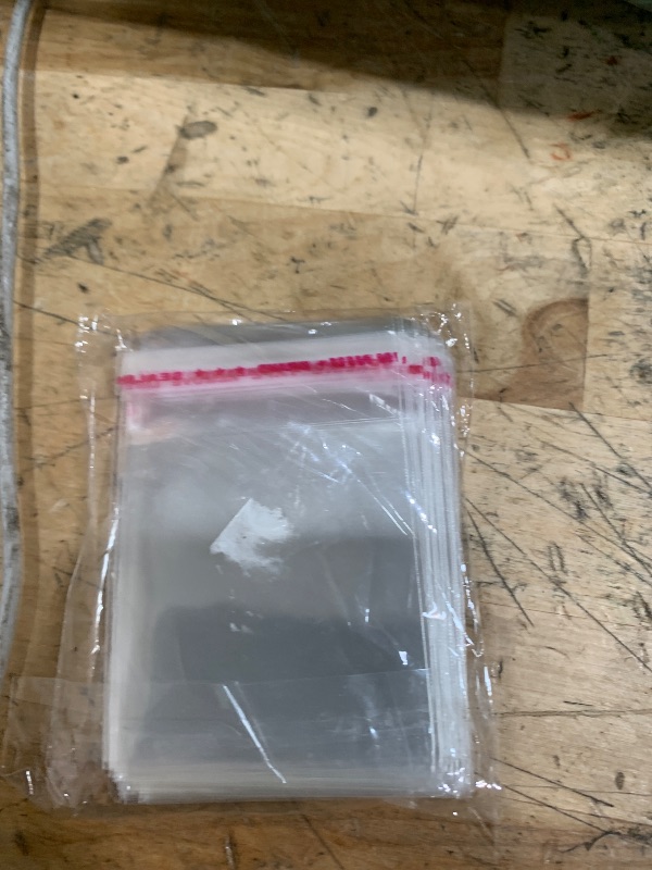 Photo 1 of  2" x 2" Cellophane Bags Self Adhesive Clear Small Jewelry Bags Self Sealing Plastic Cello Bags 1Mil for Earrings Cookie Candy Beads Coins Gifts Decorative (18 Sizes to choose from)