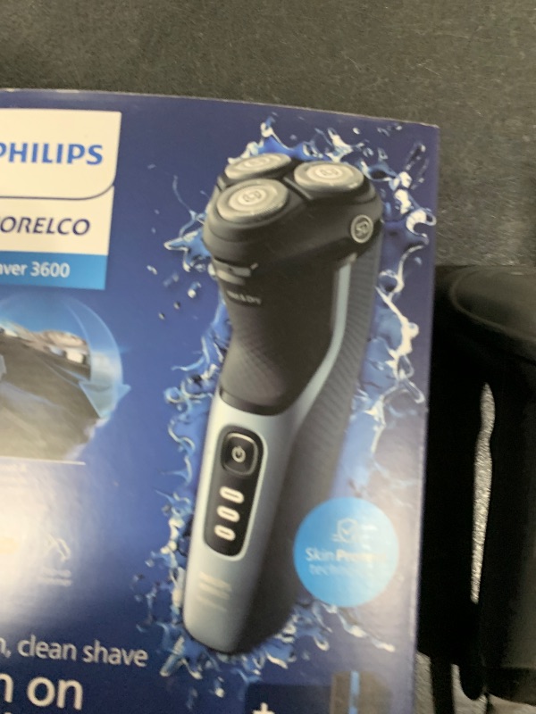 Photo 1 of Philips Norelco Shaver 3600 Series, Wet and Dry Electric Shaver, P-Cap, Travel Pouch, Storm Blue, Model S3243/91