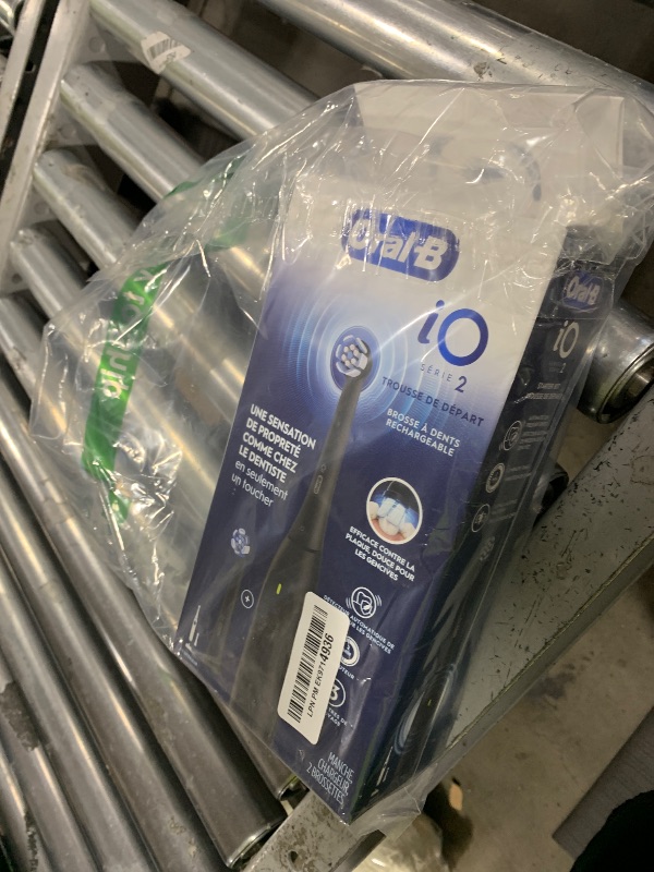 Photo 1 of Oral-B iO Series 2 Rechargeable Electric Powered Toothbrush Starter Kit, Night Black with 2 Brush Heads - Automatic Pressure Sensor to Protect Gums - 3 Modes - 2 Min Timer