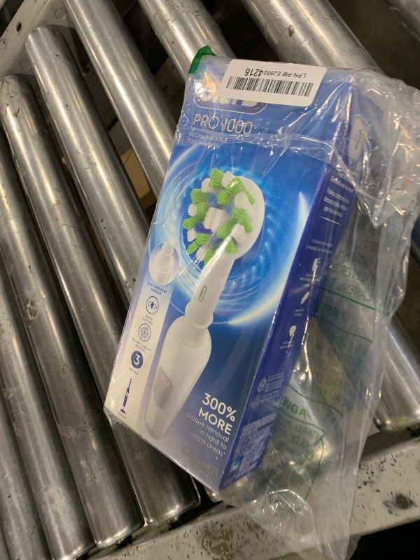 Photo 1 of Oral-B Pro 1000 Rechargeable Electric Toothbrush, White