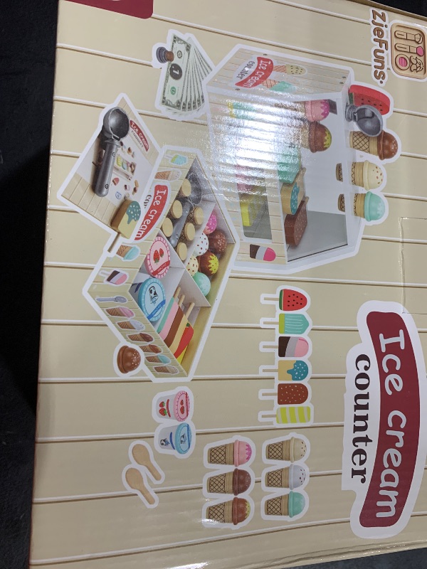 Photo 1 of ZJEFUNS Wooden Ice Cream Toys for Kids Ice Cream Counter Shop for Toddlers Pretend Play Food Scoop and Serve with Scoop & Menu & Fake Money for Boys and Girls Ages 3 4 5 6.