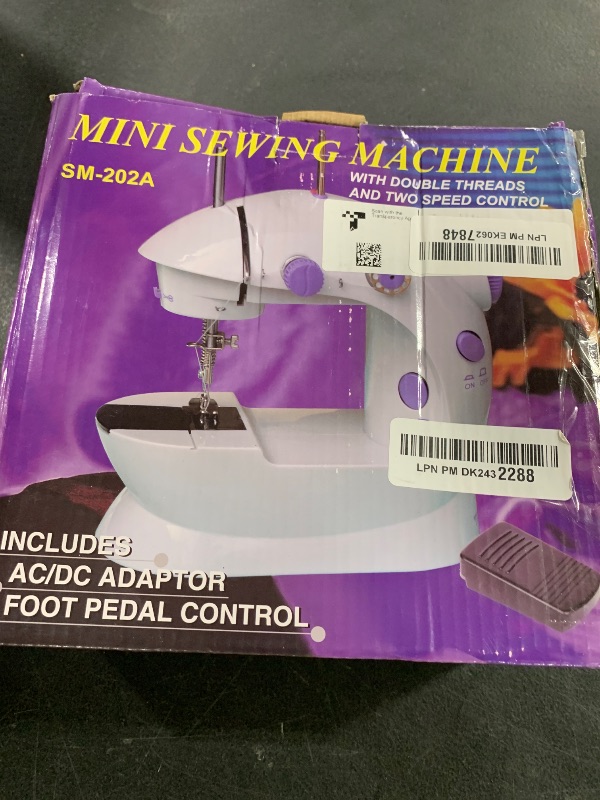 Photo 1 of Maelifu Mini Sewing Machine for Beginner, Dual Speed Portable Sewing Machine, Small Household Electric Portable Sewing Tool with Sewing Kit for Adults Kids DIY Crafts