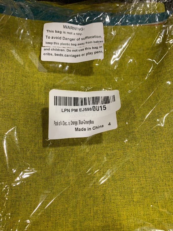Photo 1 of yeabwps Pack of 4 Decorative Outdoor Waterproof Throw Pillow Covers ONLY Square Garden Cushion Cases for Patio, Couch, Tent and Sofa, 18 x 18 Inches, (Yellow, Light Green, Orange, Blue-Green)