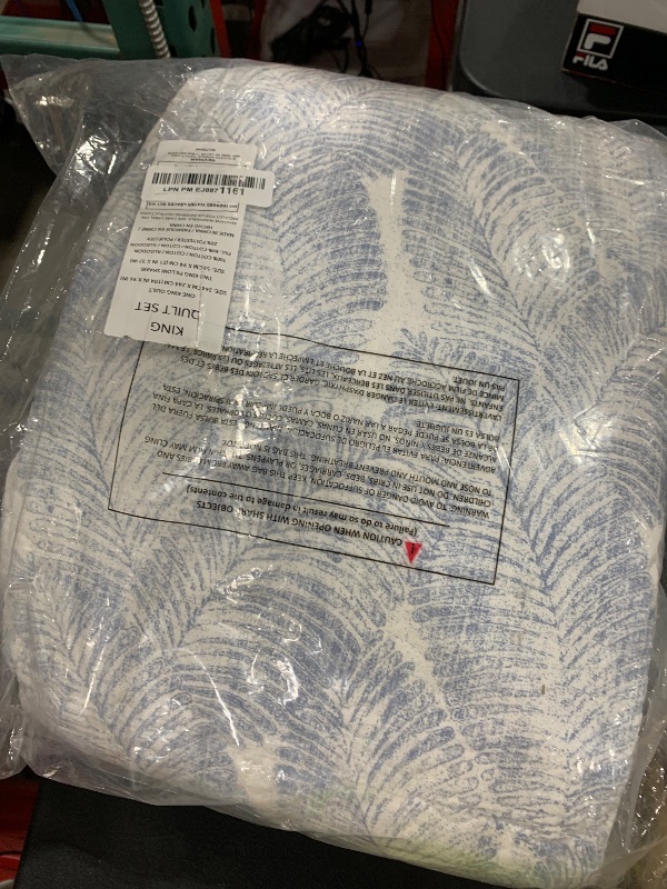Photo 1 of Tommy Bahama - King Quilt Set, Reversible Cotton Bedding with Matching Sham, Coastal Bedding Set with Textured Reverse (Distressed Water Leaves Blue, King)