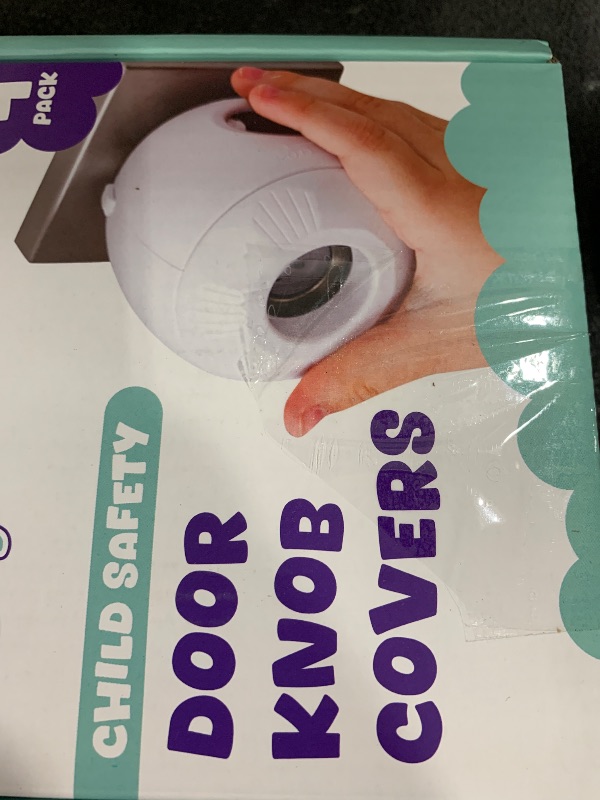 Photo 1 of Child Safety Door Knob Cover (4 Pack) Hard-to-Remove Dual-Lock Door Handle Covers for Kids - Reusable Baby Proof Door Knob Locks - Installs Easily, No Tools Needed (White)