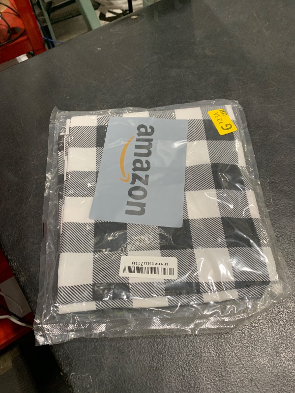 Photo 1 of Essifunia Waterproof Plaid Tablecloth Fabric - Oblong 52x70 Inch Classic Buffalo Tartan Table Cloth for Indoor/Outdoor Use - Washable Table Cover for Dinner, BBQs, and Parties