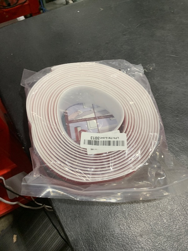 Photo 1 of Floor Transition Strip 2" Self Adhesive Flat Vinyl Flooring Transitions Strip with Strong Backing (5cm, 20FT, White)